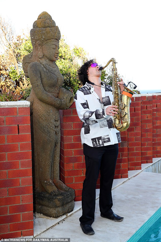 A saxophonist brings live music to the party.