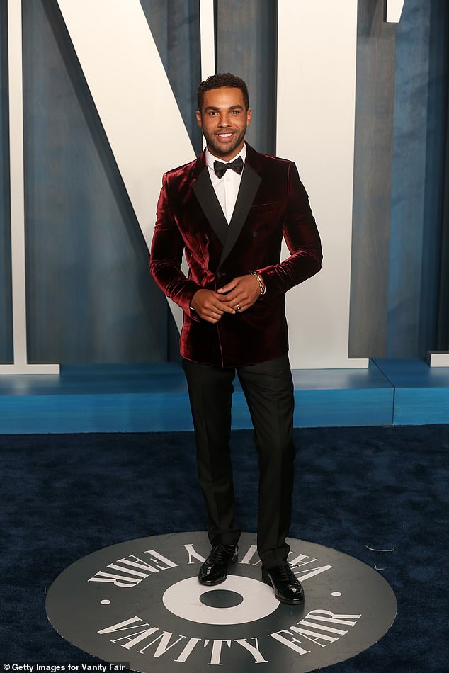 New Role: Lucien Laviscount is lining up to become the new 007 to replace Daniel Craig.  Pictured: The Emily in Paris actor attends the Vanity Fair Oscar Party in Beverly Hills, California, March 2022