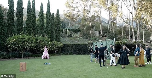 In an enlarged shot of the garden, royal fans could see the hedges surrounding the grounds, as the Duchess posed in front of the leafy Sicilian lemon trees.