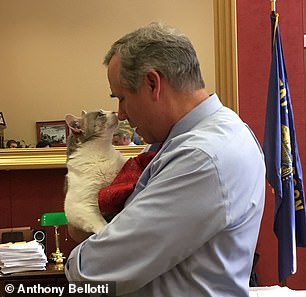 Delilah in July 2019 meeting Senator Jeff Merkley, who helped shut down her lab