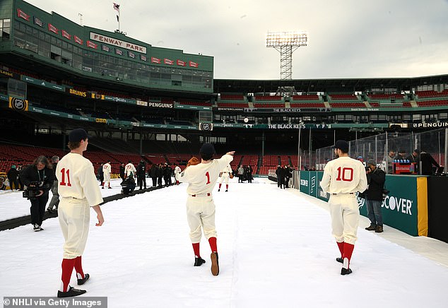 Jeremy Swayman #1 of the Boston Bruins throws a baseball before the Discover NHL Winter Classic 2023 game between the Pittsburgh Penguins and the Boston Bruins at Fenway Park