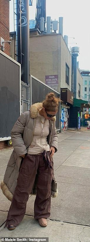 Quirky: She added a beige puffer jacket with faux fur trim and accessorized with some gold jewelry and a pair of black sunglasses.