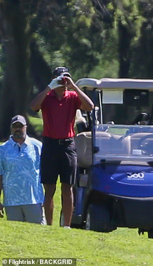 Barack appeared to have lost his ball at one point during the round, looking at the green through a binocular.