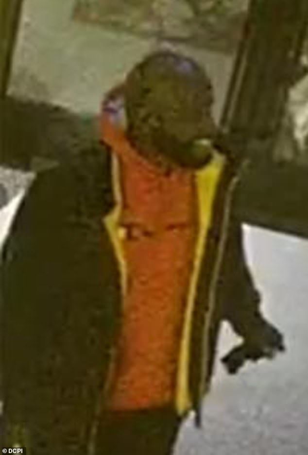 The suspect (pictured) is described as a male, dark complexion, approximately 40-50 years of age, heavyset, bald and was last seen wearing a red Champion hoodie, black jacket, black pants and black tennis.