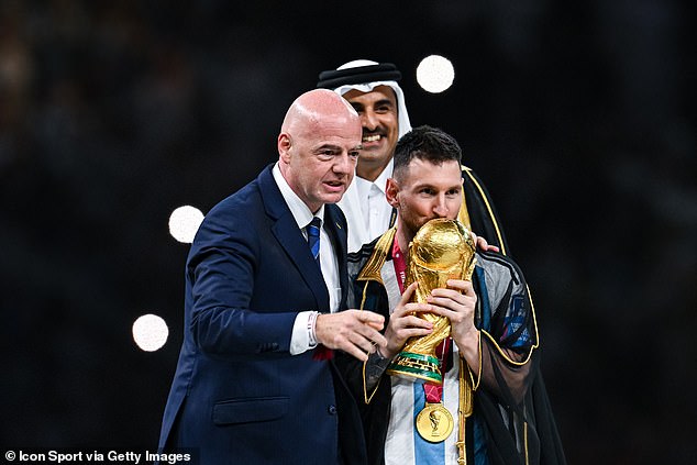 Infantino has been accused in recent months of wanting to be the center of attention.  Before Argentina's talisman Lionel Messi was presented with the World Cup winning trophy, he was draped in a black tunic, or bisht, a traditional Qatari garment.  Infantino then slowly led Messi towards the trophy, and then across the stage towards his teammates.