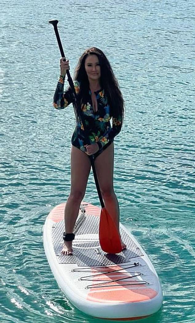 Wayne's World star Tia Carrere showcases fit frame in a bikini for 56th  birthday and the New Year