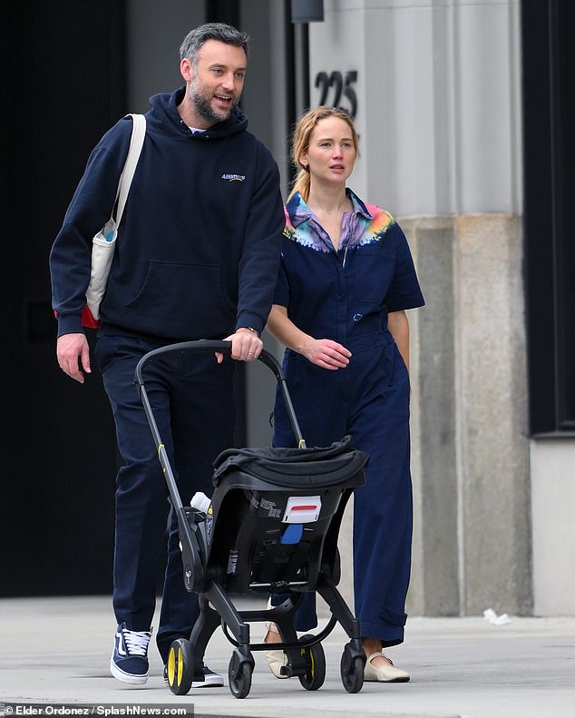 Having it all: The A-list mom shares Cy with her husband of three years, Cooke Maroney, 38.  The Silver Linings Playbook star met the Manhattan art gallery owner in 2018 through a mutual friend.