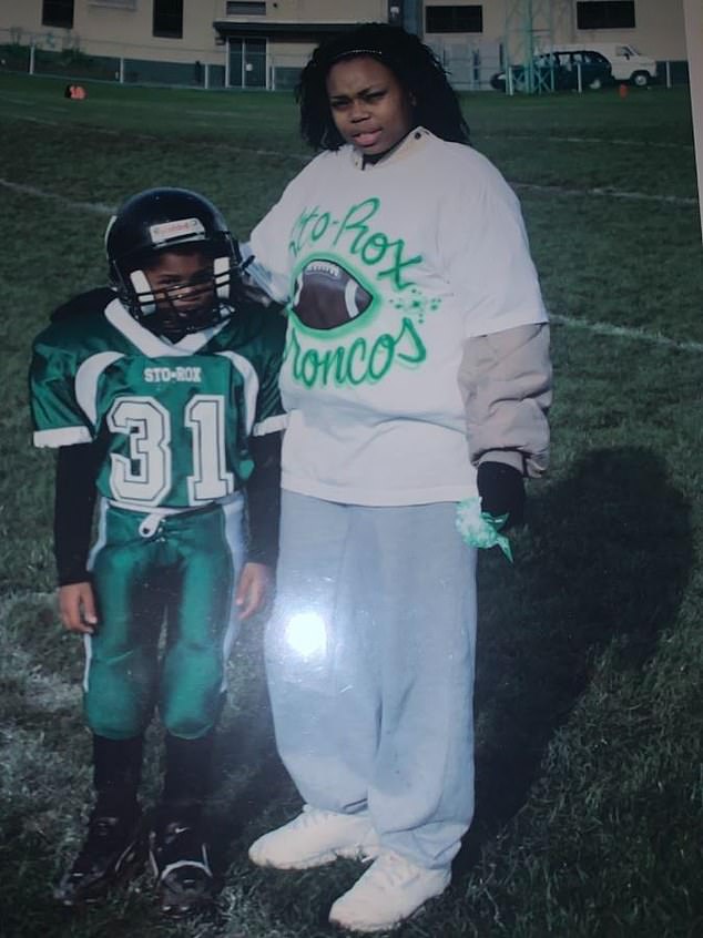 Hamlin pictured alongside his mother Nina during his playing days as a child.  He said he chose to stay close to home when he went to college so he could be close to his family.