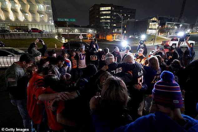 Fans waited outside the University of Cincinnati Medical Center all night after Monday's game, hoping for good news about Hamlin's condition.