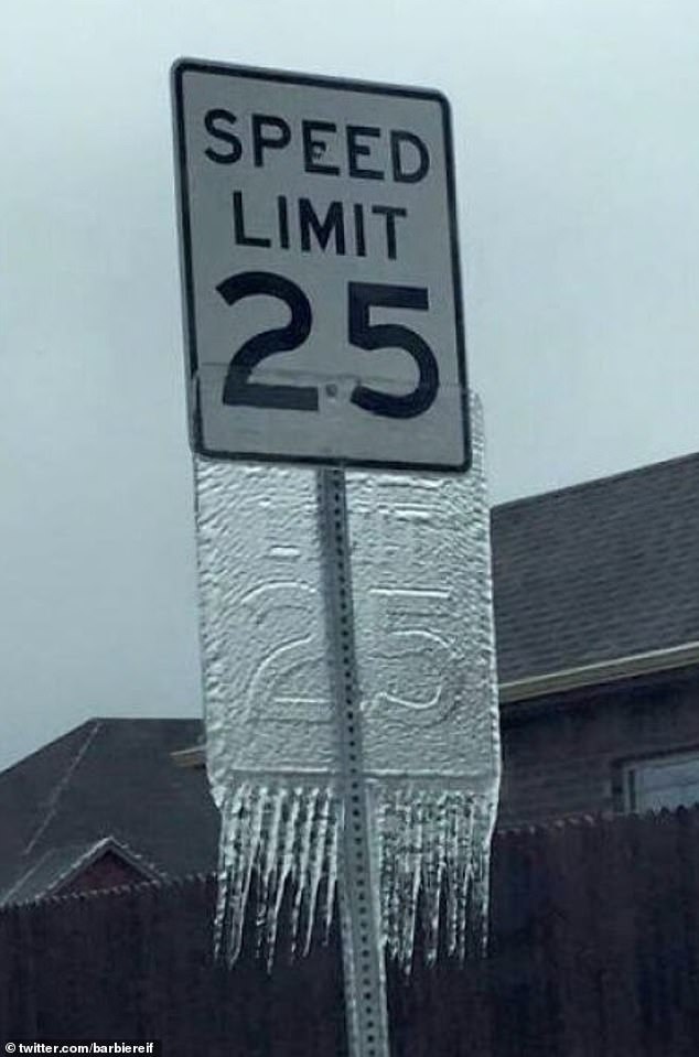 This frozen speed limit sign, in Oklahoma, will make you look a second time, as the ice that slides down the front is perfectly printed.