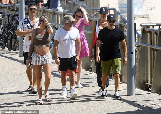 The reality stars looked relaxed as they strolled along Sydney's beaches.