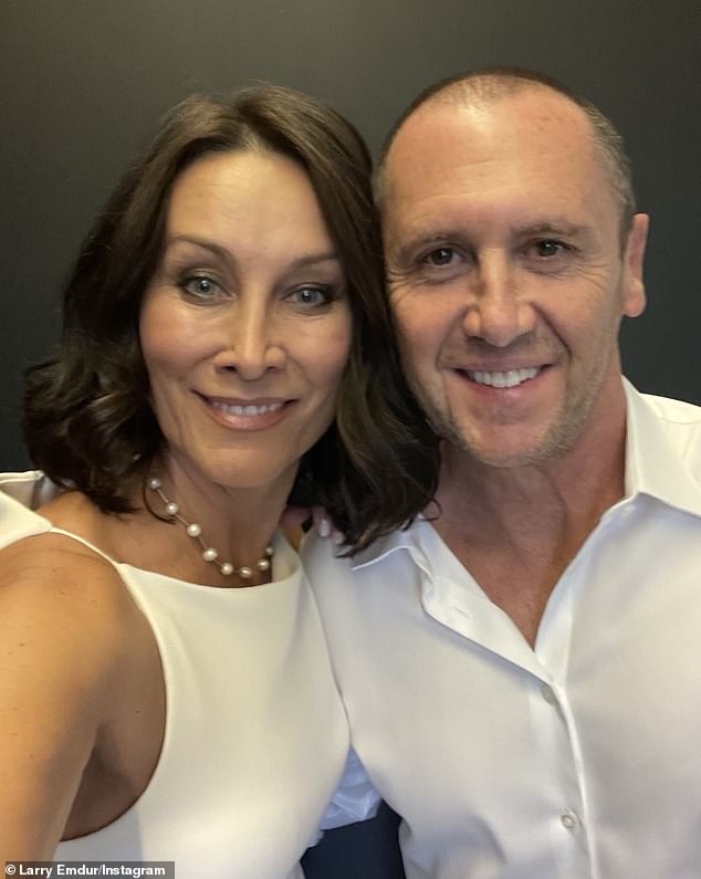 Renovation: Larry Emdur proudly displayed his latest investment property on Sunday, as he continues plans to renovate the 'dilapidated termite nest' into a 'bohemian' dream.  In the photo with his wife, Sylvie