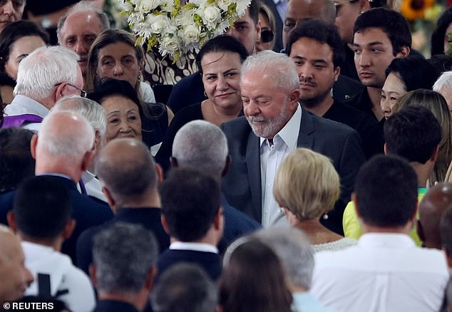 Brazil's new president, Luiz Inácio Lula da Silva (photo center), visited Pelé's open casket on Tuesday, as one of his first actions as the country's new head of state.