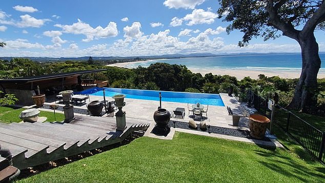 Phillips said the group destroyed about $10,000 worth of furniture around his luxurious backyard in Byron Bay (above).