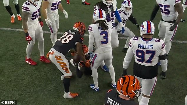 Hamlin (No. 3) got to his feet briefly after tackling Higgins before falling backwards in shocking scenes as the Buffalo Bills played the Cincinnati Bengals.