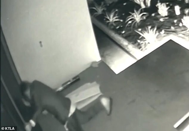 A camera on the front of the house showed the teen kicking the door and trying to charge at it.