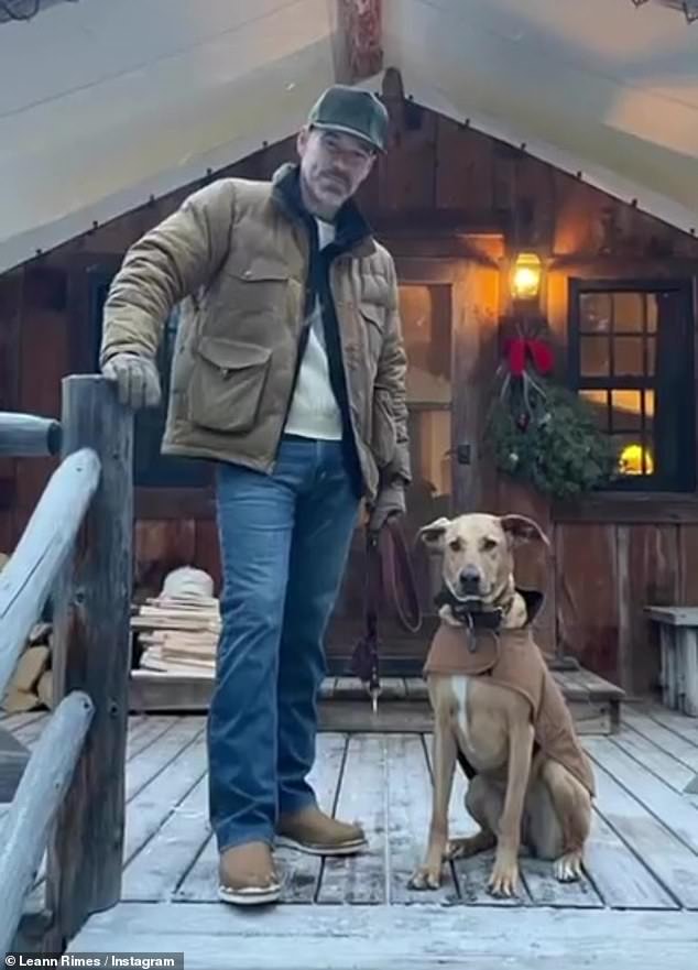 'The dream': another image showed Eddie posing in front of a cabin with his dog