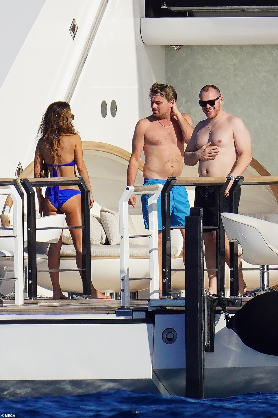 Life is good!  DiCaprio and his friends appeared in high spirits during the outing.