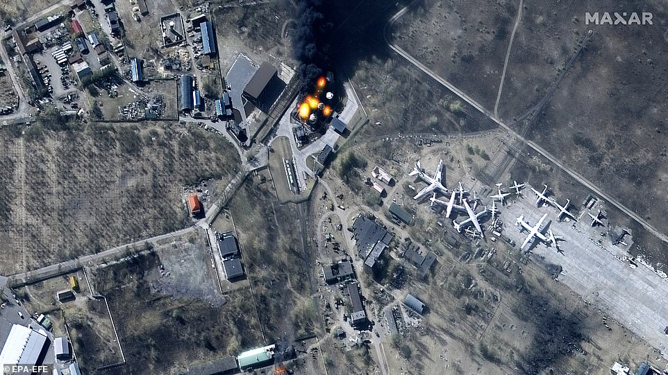 Burning buildings and fuel storage tanks at Antonov Airport, Hostomel, Ukraine on March 11, 2022