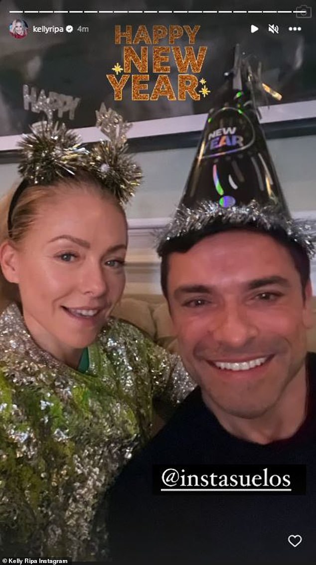 She says no: Kelly Ripa, who celebrated at home with husband Mark Consuelos, said Andy tried to say hi