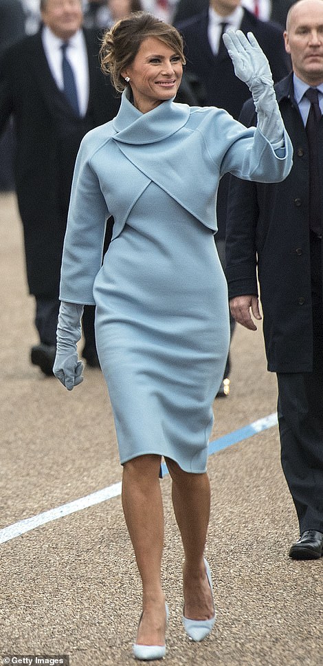 Melania Trump also wore gloves and a cape-like shrug to her husband Donald's inauguration in 2017