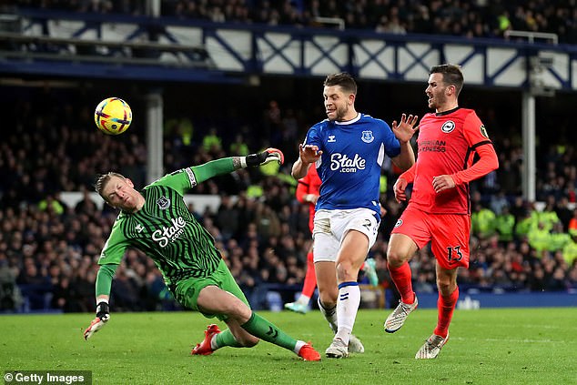 Jordan Pickford watches as Pascal Gross shoots Brighton's fourth goal of the game