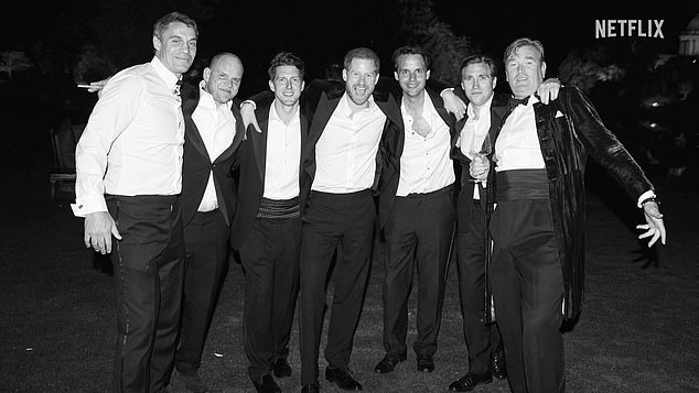 Mr. Mann was photographed among a group of wealthy and privileged men who make up Harry's inner circle.  Pictured: The Duke of Sussex, center, with Jack Mann, second right, and other friends at Harry's wedding in May 2018.