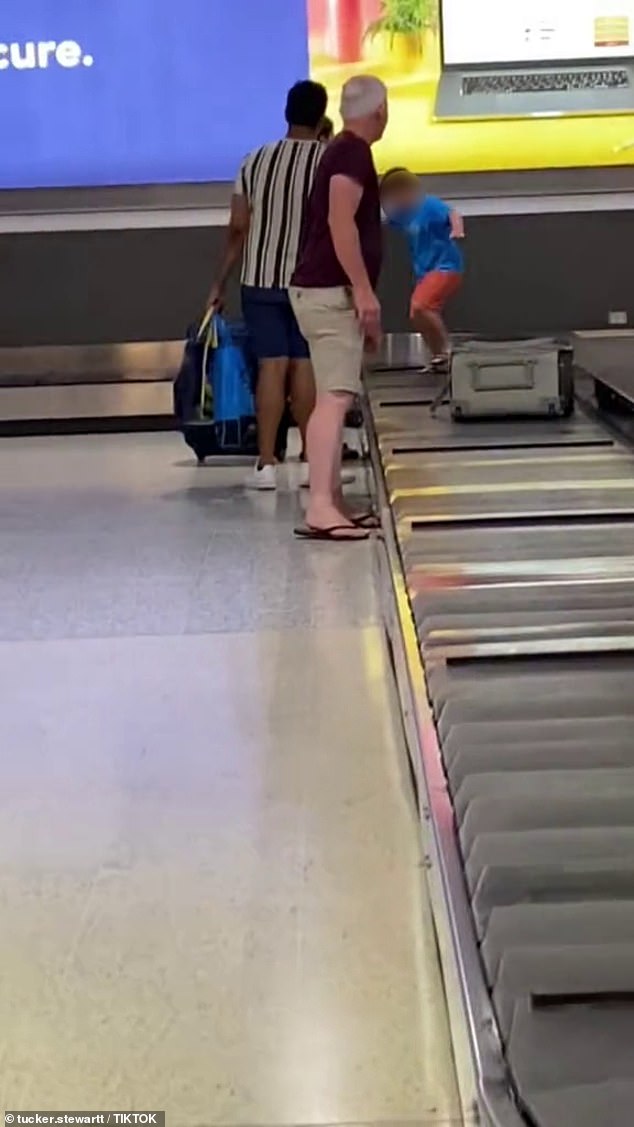 The video showed the boy ignoring his mother telling him to get off and running rampant on the conveyor belt.