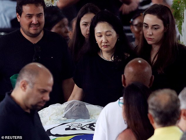 More than 230,000 mourners had filed past Pelé's open casket at Vila Belmiro, the stadium a few kilometers away where he played for Santos for 18 years and made the team and the city synonymous with his greatness.