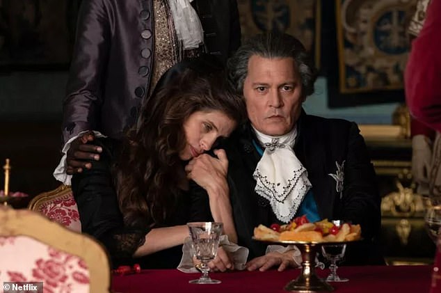 In promotional images released Tuesday, Depp looked regal as the French monarch alongside co-star and director Maiwenn Le Besco, who plays King Louis' mistress Jeanne du Barry.