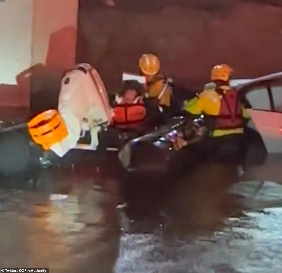 First responders respond to a call in Tustin from a group of adults who were stranded in a submerged vehicle over the weekend.  Two people have already died in the storm that took place on New Year's Eve and more are expected to happen as the new storm approaches.