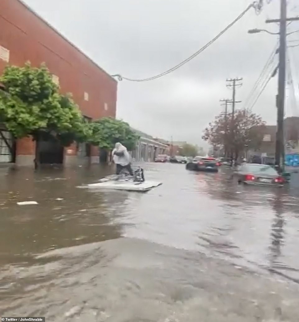 A man in San Francisco moved on a raft when high water levels prevented him from driving after the storm hit on New Years.