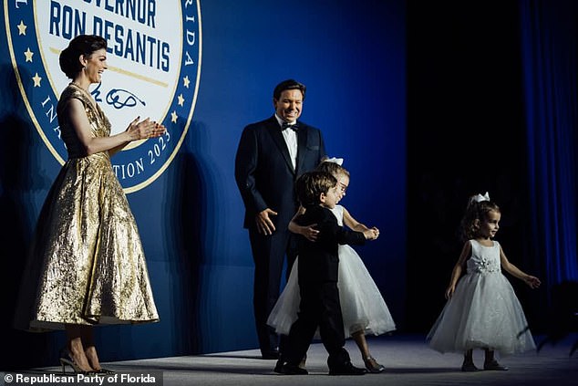 The first couple watched and smiled as their three children, Madison, Mason and Mamie, danced on the stage at the inaugural ball.