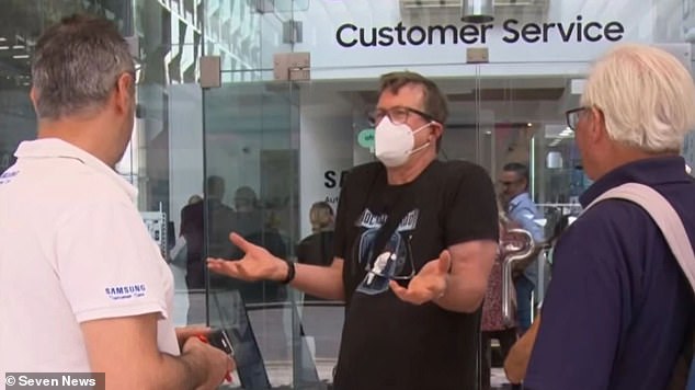 Faulty update causes phones to get stuck on boot screen showing Samsung logo and the only way to fix the problem is a factory reset which means everything not backed up will be lost (pictured , a frustrated customer outside the Samsung Service Center in Adelaide)