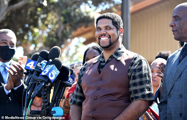 Anthony Bruce, the great-great-grandson of Willa and Charles Bruce, smiles as Governor Gavin Newsom signs SB 796, a bill that allows land in Manhattan Beach to be returned to the descendants of its original owners.