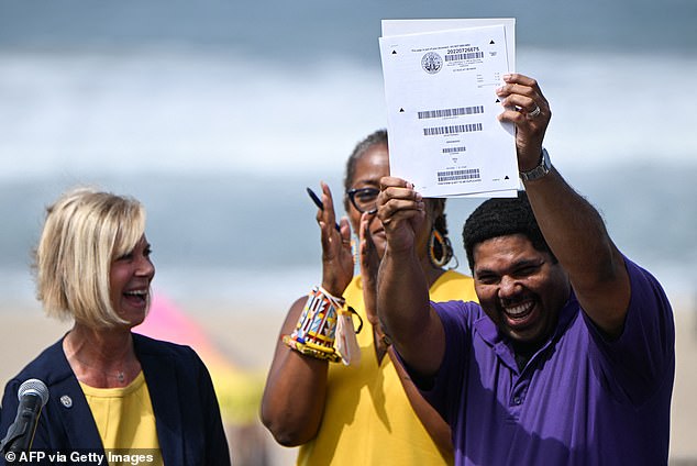 Anthony Bruce (right) with Los Angeles County Board of Supervisors President Janice Hahn (left), who announced the family's plans to sell the property to the county on Tuesday.