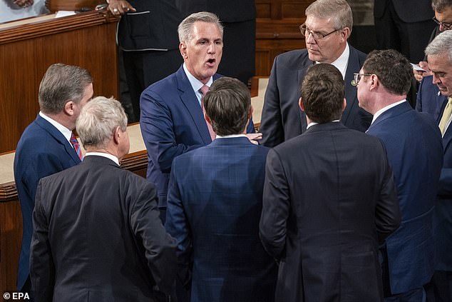 House Republican Leader Kevin McCarthy speaks to colleagues amid Tuesday's drama as a group of rogue Republicans derailed the presidential vote for the California Republican, who has been the leader of the House Republican Party of Representatives since 2019.