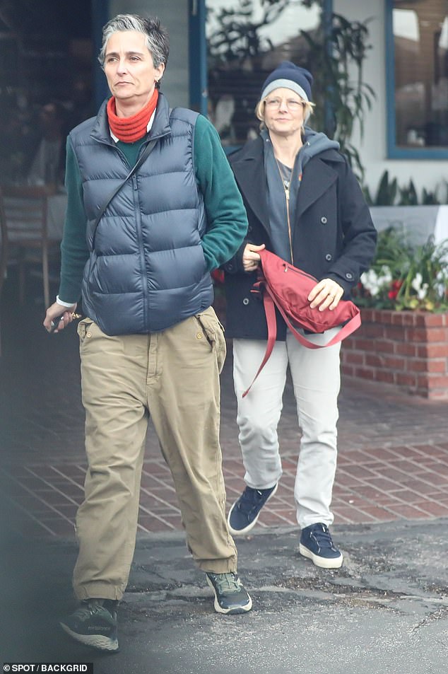 Staying warm: The longtime couple, ages 60 and 53 respectively, bundled up on an unusually gloomy day for lunch in West Hollywood