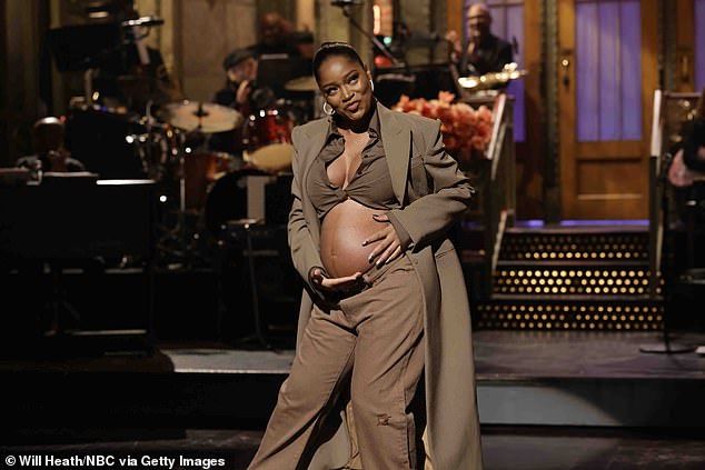 Surprise!  The star had a surprise pregnancy reveal when she hosted Saturday Night Live earlier last month during her opening monologue onstage.