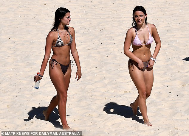 Unlike most of the country, Adelaide will be sweltering at the weekend, with temperatures in the 30s.  In the photo, two women on a beach.