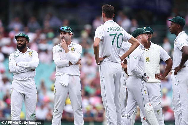 The Proteas players were furious at the decision, led by captain under pressure Dean Elgar (second from left)