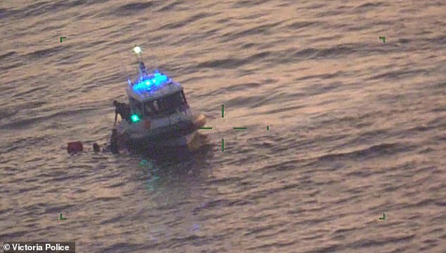 In the photo, the rescue boat brings the men on board after locating them off the coast.