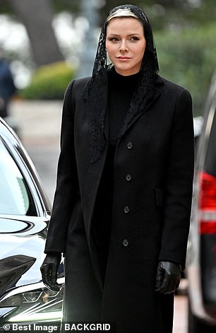 The royal mother of two bowed her head briefly as she walked towards the cathedral ahead of today's event.