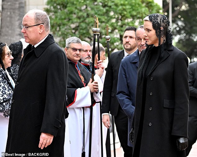 The royal mother of two followed her husband as they arrived at the funeral this morning.