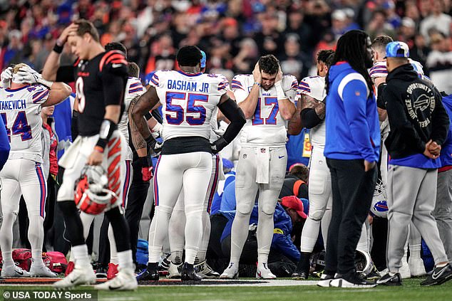 Teammates surrounded Hamlin, and the game was postponed after he was taken to the hospital.