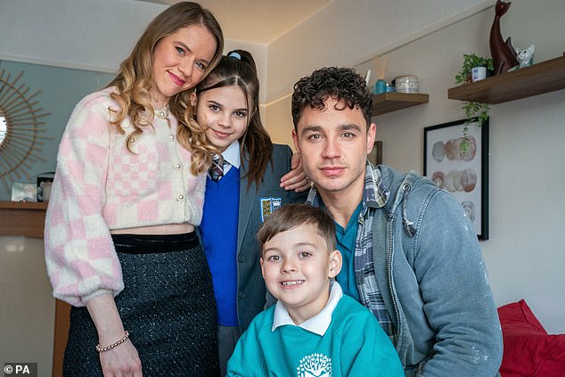 Cast: Scarlett Thomas, 14, (center), who plays Izzie Charles on the show, is the daughter of former Corrie stars Ryan Thomas and Tina O'Brien, who played Jason Grimshaw and Sarah Platt.