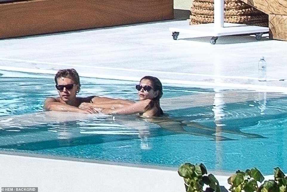 Aww: The couple enjoyed some quality time together at the pool.