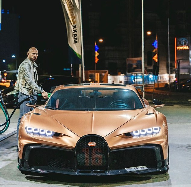 Pictured: Andrew Tate poses next to a Buggati Chiron in a now-famous photograph after he used it to mock environmental activist Greta Thunberg shortly before her arrival.  According to Spy News, the Buggati is one of the cars that was seized