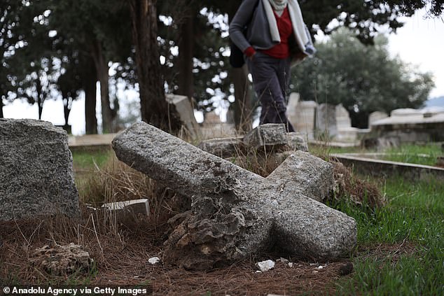 A general view of the damaged Protestant cemetery by Jewish settlers who sneaked into on Mount Sion in East Jerusalem on Sunday, January 1 in Jerusalem January 4, 2023