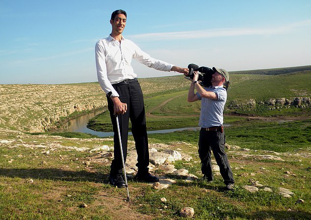 Kösen became the world's tallest living man in 2009 at 8ft 1in at the age of 26.  He has grown another two inches since then.